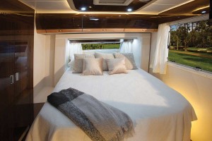 Sunliner Monte Carlo MC3 - Bedroom with two slide out walls to create luxurious space.